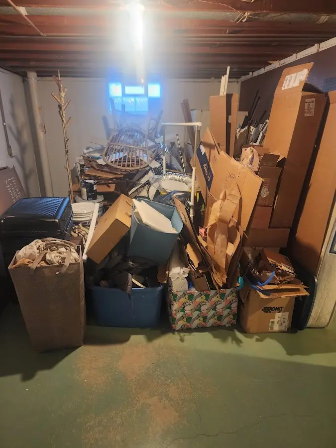 Roll-off dumpster container at job site for Yard Waste Dumpster Rental in Sheridan